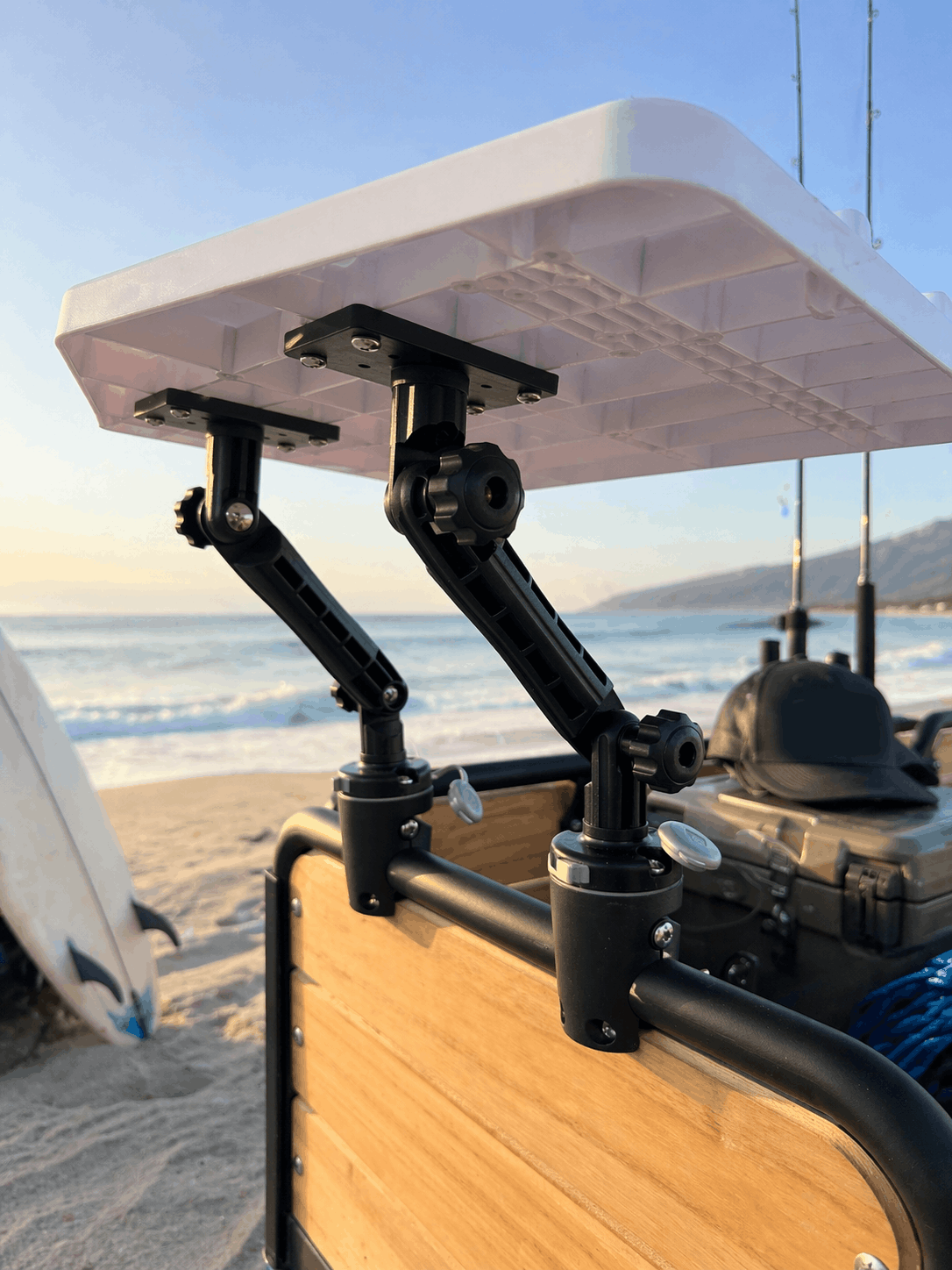 e-Beach Wagon rail-mount bait board with fish fillet setup on beach