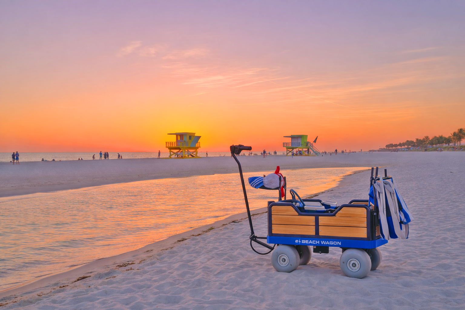 electric beach wagon on beach at sunset